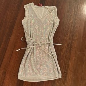 This is a silver sequined dress from Juliette Longuet in a size XS.